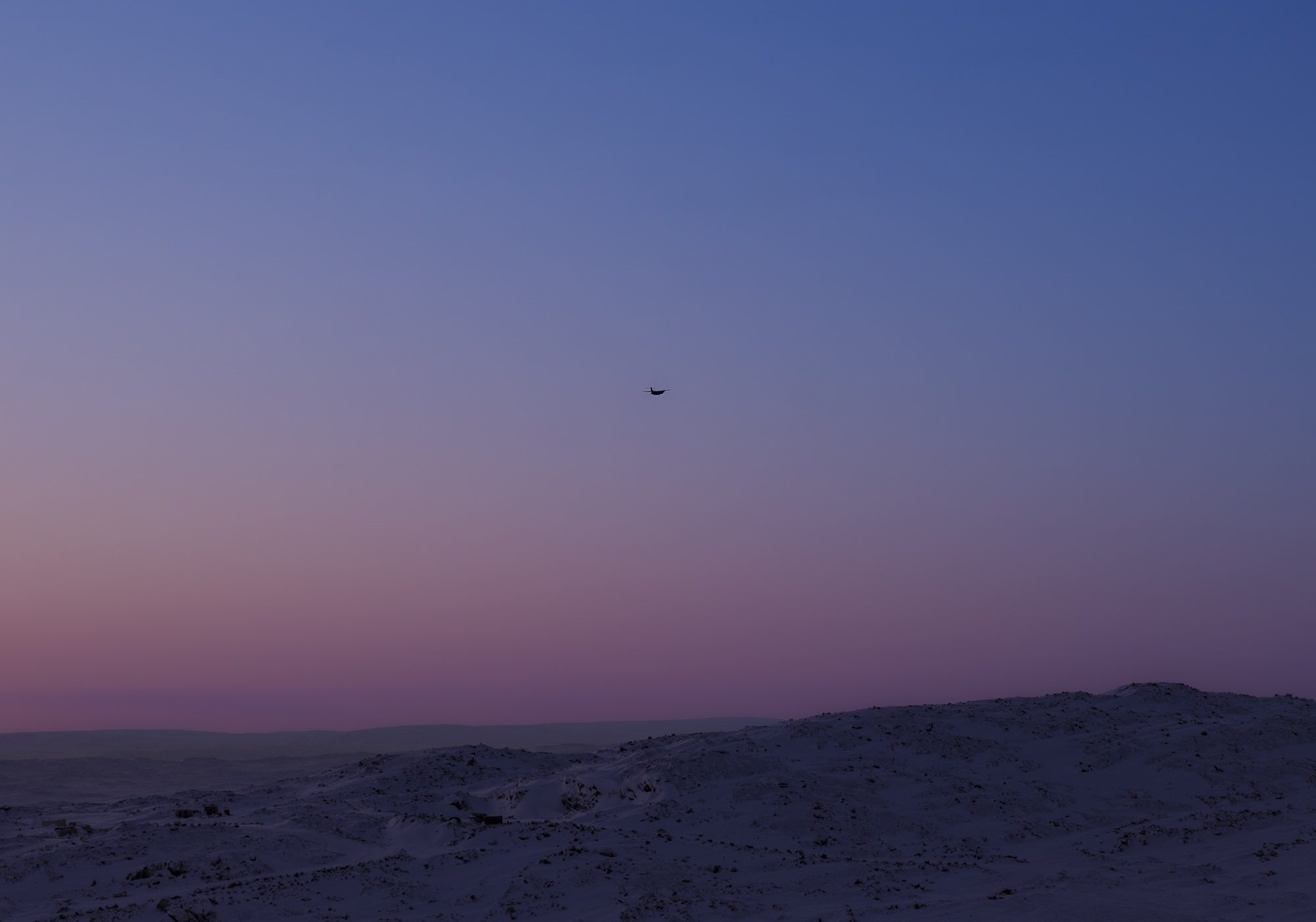 PLANE TAKEOFF SUNSET